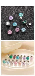 Macro shot of 6mm millennium rose-cut zircon stud earrings in various vibrant colors