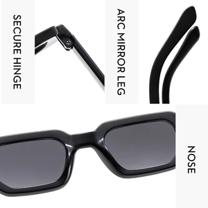 Detail view of reinforced hinges, ergonomic curved temples, and nose pads of black sunglasses