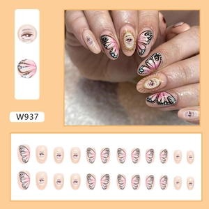Oval press-on nails featuring artistic butterfly wing and mystic eye graphic patterns