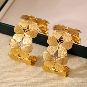 Exquisite 18K gold butterfly hoop earrings with matte textured hollow floral design