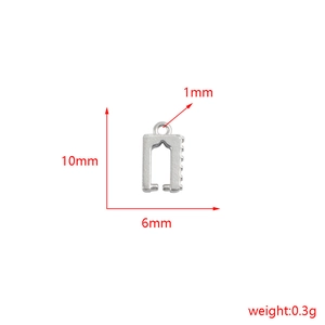 Detail view of silver jewelry charm dimensions showing 10mm height and 6mm width specs