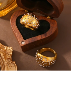 British style gold plated titanium steel ring with inlaid crystals in a wooden heart box