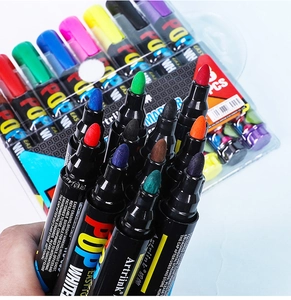 Detailed view of eight colorful whiteboard markers with fiber tips for office teaching