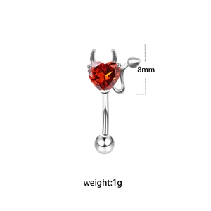 Detailed view of silver punk eyebrow ring featuring 8mm bar and red devil heart zircon
