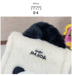 Detailed macro of the Angry Panda plush bag featuring soft faux fur and embroidery