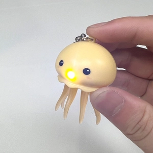 Mignon porte-clés méduse LED lumineux avec anneau métallique argenté pour sac