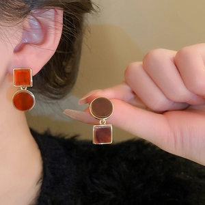 Vintage asymmetric amber acetate geometric earrings with gold metal frame and silver needles