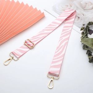 Pink and white zebra pattern wide canvas shoulder strap with gold metal lobster clasps