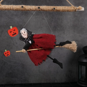 Halloween witch doll on a wooden broomstick hanging ornament for party decoration