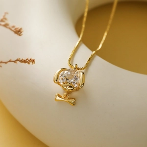 Gold plated 18K necklace with a cute dog bone pendant and sparkling zircon stone