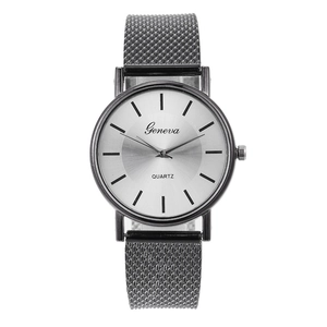 Close-up of Geneva quartz watch featuring silver sunray dial and black mesh strap