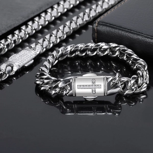 Polished stainless steel Cuban bracelet with a cross buckle set in clear stones