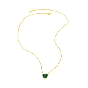Detail of gold chain necklace with emerald green heart pendant and lobster clasp