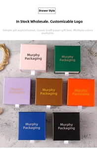 Colorful drawer-style jewelry gift boxes with ribbon pulls in seven vibrant shades