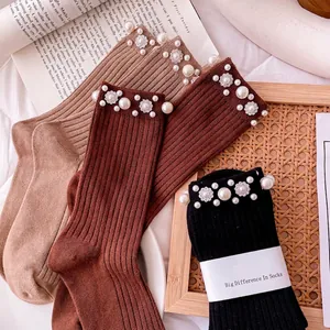 Mid-calf cotton socks for women with elegant pearl and rhinestone flower embellishments