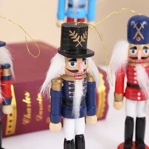 Classic wooden nutcracker soldier ornaments on vintage red book Christmas decoration