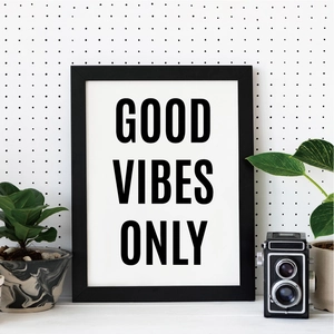 Detail of 2.5 inch black letter stickers showing Good Vibes Only on classroom wall