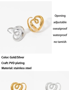 Detail of adjustable stainless steel heart rings in gold and silver with PVD coating