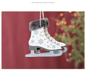 Detailed view of wooden ice skate ornaments with fur trim and snowflake pattern