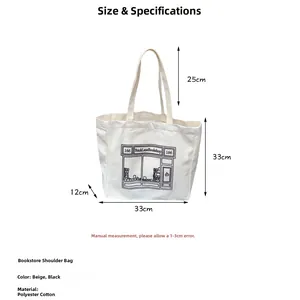 Detailed size chart of beige canvas tote bag showing 33x33x12cm dimensions and strap height