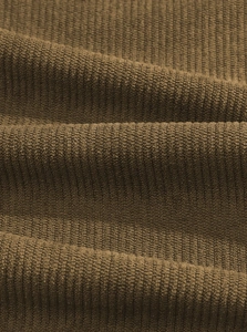 Close-up of premium dark brown corduroy fabric with high-density vertical ribbed texture