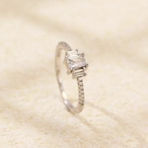 Detailed macro view of square zircon stone and small diamonds on S925 silver ring