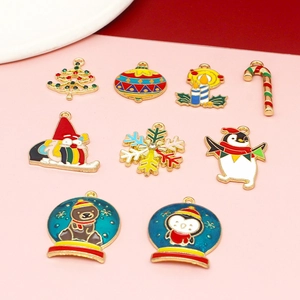 Detailed flat lay of Christmas alloy charms including snowflakes and candy canes