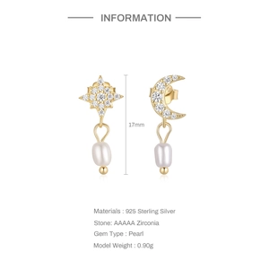 Detailed close-up of S925 silver star and moon earrings with pearls and zircon stones