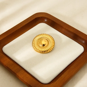18k gold plated ribbed round croissant brooch on beige velvet cushion for women
