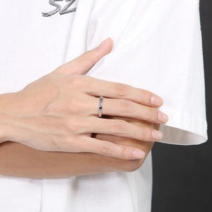 Minimalist 3mm silver stainless steel ring with matte finish on male finger