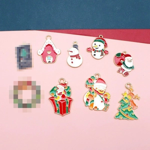 Christmas themed enamel alloy pendants featuring snowman, Santa and reindeer charms