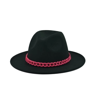 Detail of flat brim wool felt fedora featuring bold rose pink chunky chain decoration