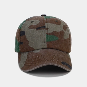 Detail of jungle camouflage baseball cap featuring durable cotton twill and reinforced stitching