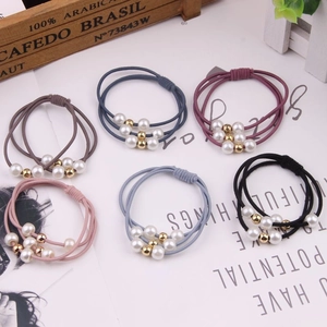 Détail d'élastiques à cheveux haute élasticité avec perles et billes en six couleurs