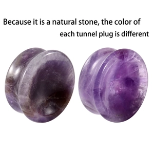 Detailed view of natural purple amethyst stone ear tunnels with unique organic textures
