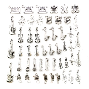Silver musical instrument charms collection with guitars, violins and saxophones for DIY crafts
