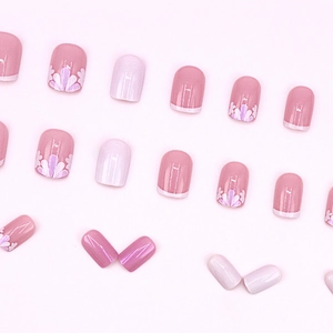 Pink and purple press-on nail kit with floral patterns and glossy finish for women