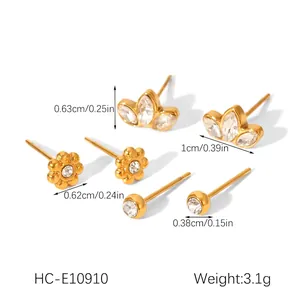 Detailed view showing dimensions and weight of three pairs of gold zircon stud earrings