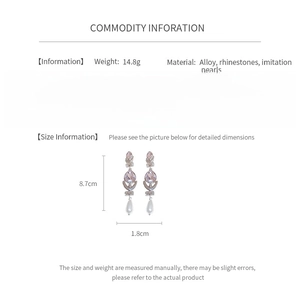 Detailed chart showing tassel pearl earrings size 8.7x1.8cm and 14.8g weight specs