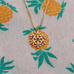 Gold plated snowflake necklace with colorful zircon stones on elegant box chain