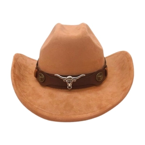 Detailed macro view of brown western cowboy hat featuring a silver longhorn bull head emblem