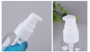 Detailed view of empty and filled transparent plastic pump bottles for travel toiletries