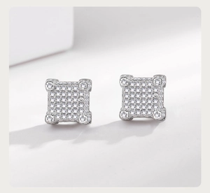 Close-up of hip hop silver square stud earrings with pave-set cubic zirconia stones