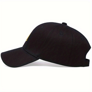 Classic black baseball cap with yellow triangle logo and curved brim, side view