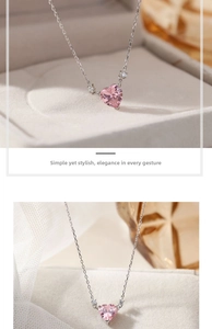 Close-up of pink heart-shaped crystal pendant with white zircon accents on silver chain