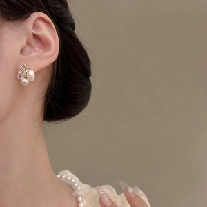 Elegant geometric cluster earrings with freshwater pearls and zircon on a gold-plated base