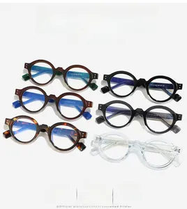 Detail view of retro round anti-blue light glasses frames in six assorted colors