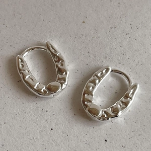Minimalist 925 sterling silver hoop earrings with irregular hammered texture and secure clasp