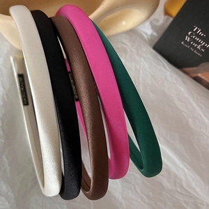 Glossy satin padded headbands in multiple colors like beige black and green