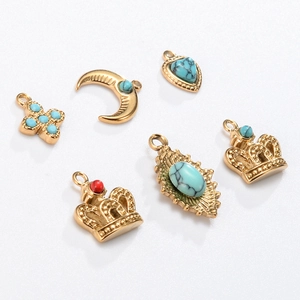 French palace style crown and moon gold pendants with turquoise and red stone inlays